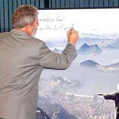 Lula assina o pôster do Rio de Janeiro